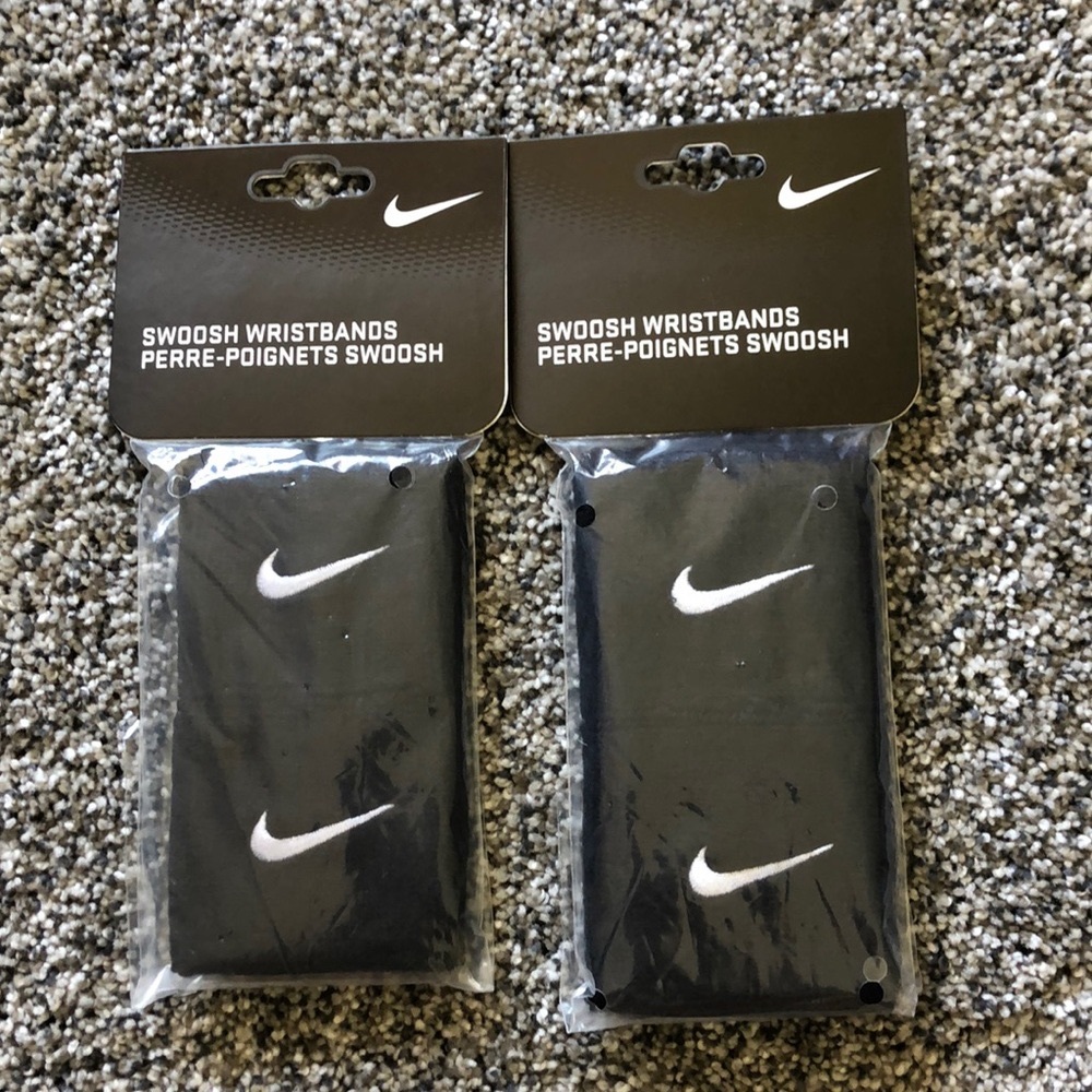 Single pack of Swoosh wristbands- pick your color. 1 black and 1 white left.